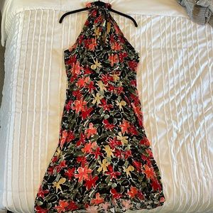 Brand new with tags midi floral dress, size medium.